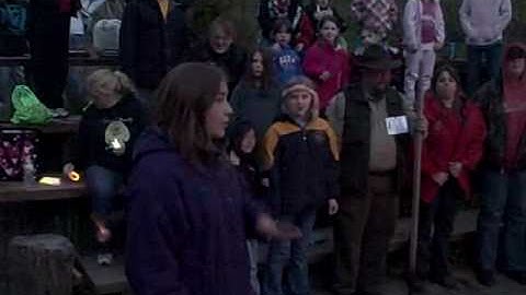 Mandy leads "repeat after me" song at Campfire