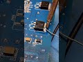 Two Soldering Irons For This Component And Added Solder. One On Each To Desolder Off The Board