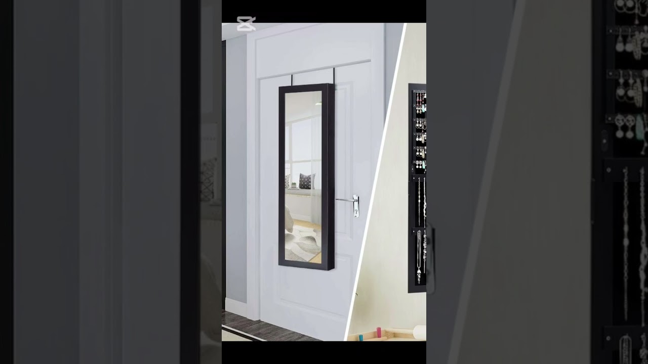 Wall mounted jewelry cabinet with mirror. 