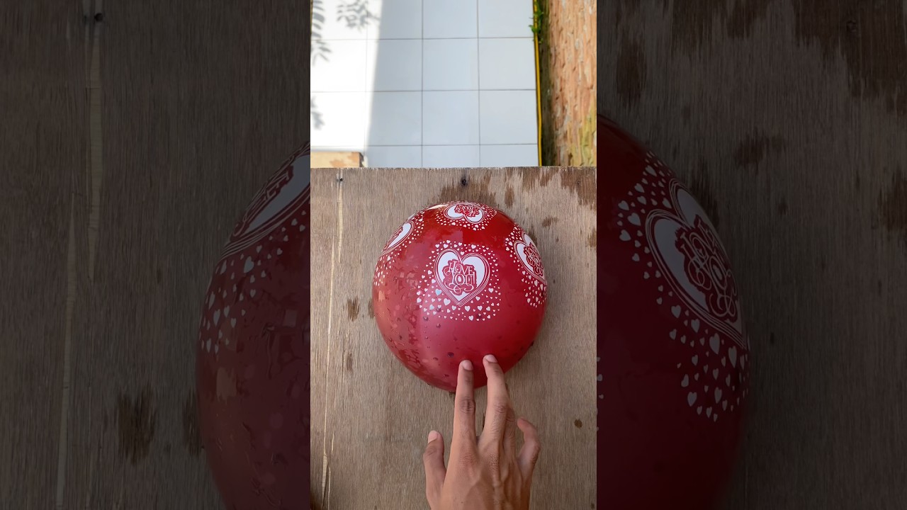 Experiment: Dropping red water balloons and water beads from a height