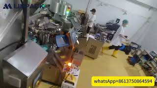 Tuna Vacuum Packaging Machine Secondary Lift Tuna Vacuum Filling And Sealing Machine Production Site