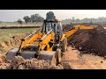 JCB Backhoe Going Bricks Plant For Digging Soil