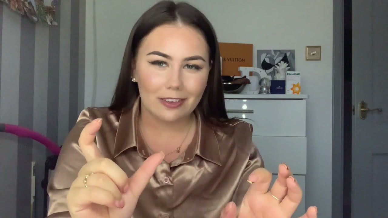 Woman in Gold Satin Blouse