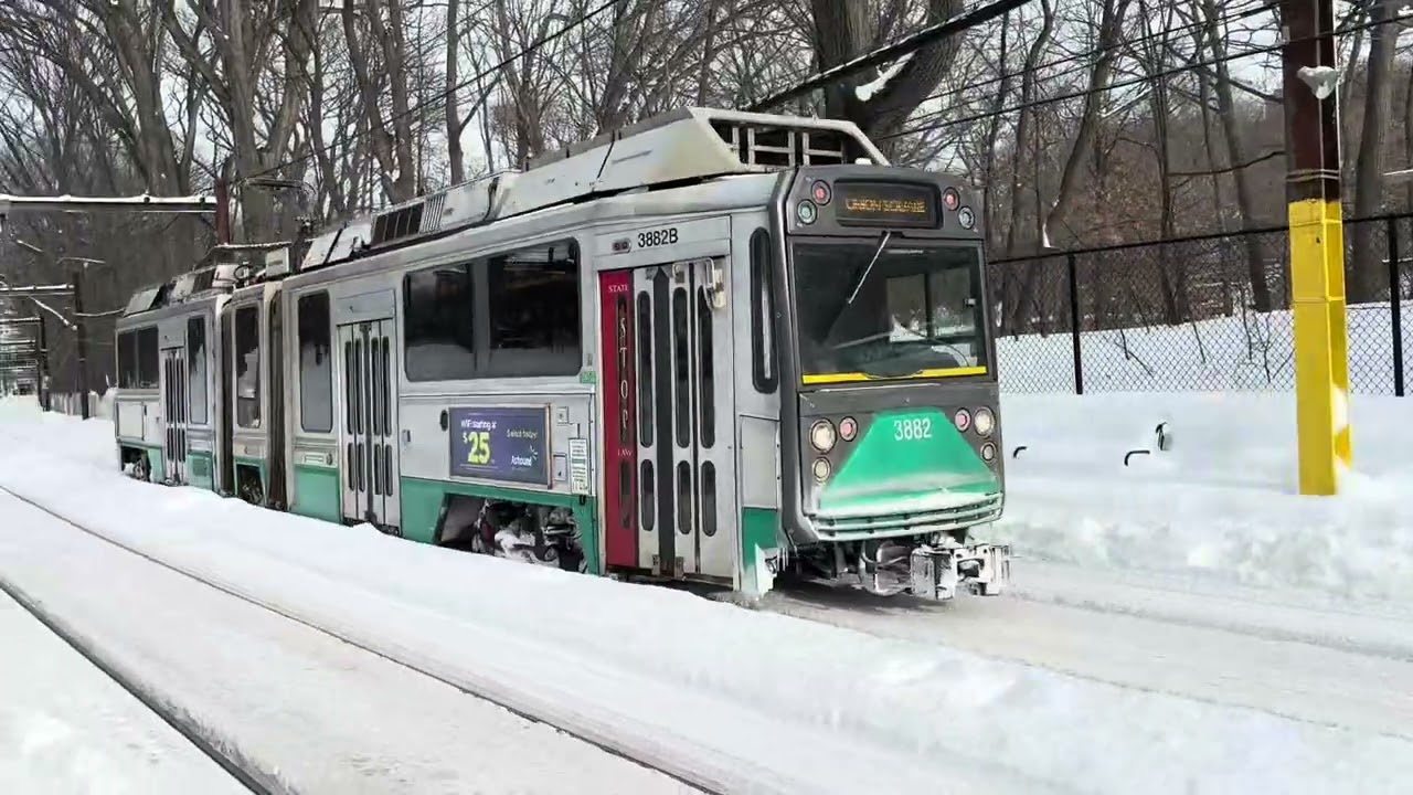 MBTA green line LRVs in the snow in Boston 