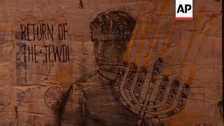 Street artist of Arab heritage tackles religion in new exhibition
