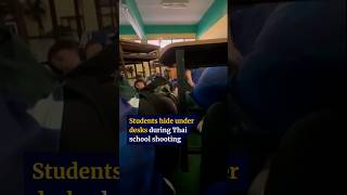 Students hide under desks during Thai school shooting
Subscribe to our YouTube channel for free here: https://sc.mp/subscribe-youtube
Seven people, including teachers and pupils, were killed at a school near the Thai capital Bangkok after a student gunman went on a rampage on Friday morning. The country’s latest mass shooting happened at the Debsirin Nonthaburi School, around an hour outside the city. Video shared on social media, and apparently filmed by a pupil during the shooting, showed harrowing scenes of children in blue uniforms cowering under wooden desks.
Follow us on:
Website: https://scmp.com
Facebook: https://facebook.com/scmp
X: https://x.com/scmpnews
Instagram: https://instagram.com/scmpnews
Linkedin: https://www.linkedin.com/company/south-china-morning-post/ Students hide under desks during Thai school shooting