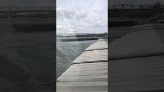 A boat with barges hit the bridge