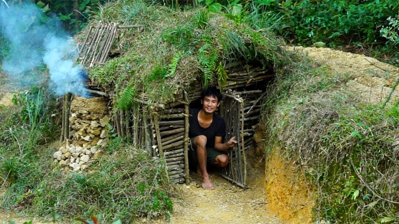 Building warm shelter new for survival and Bushcraft earth hut in the ...