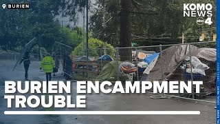 Fencing installed at Burien courthouse parking lot to manage homeless camp