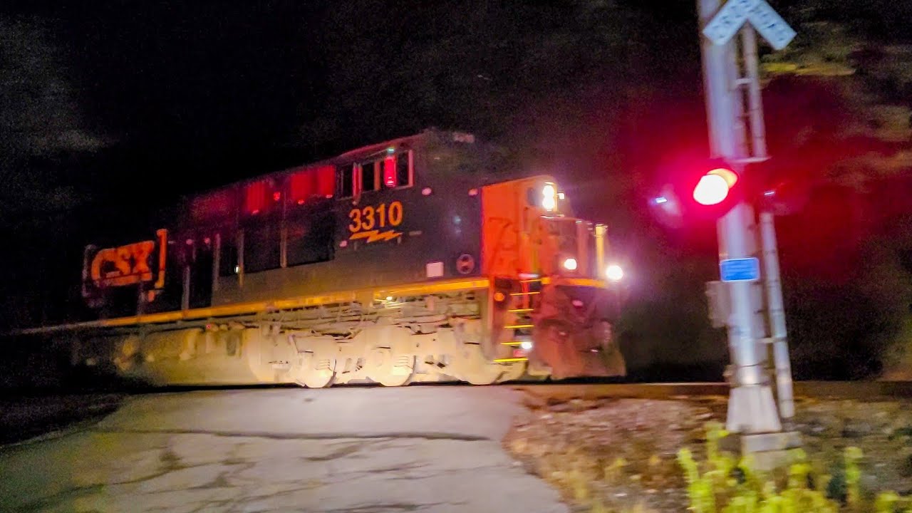 Tons of rare fallen flags on nighttime CSX mixed freight train in ...