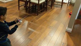 2016-12-27 Playing with their Ridemakerz car.