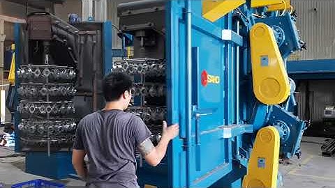 Cách đánh bavia, làm sạch và tạo nhám bề mặt nhôm đúc áp lực bằng Máy phun bi móc treo trên cánh cửa