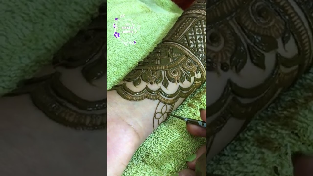 Till elbow most intricate bridal henna.