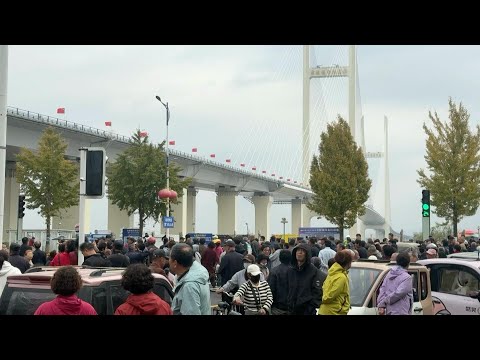 New bridge between China and North Korea opens | AFP