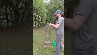 Cleaning the Grave of a Young Mother