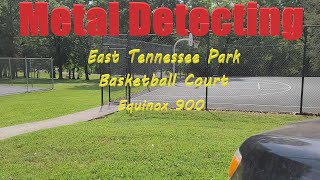 Metal detecting around basketball court in East Tennessee park.   | Minelab Equinox 900.