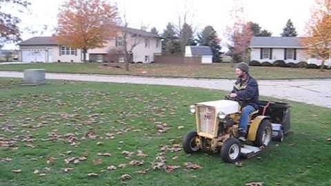 Cub cadet 1962 sweeping leaves