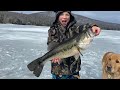 BIG OL FISH -7 year old catches big largemouth bass ICEFISHING