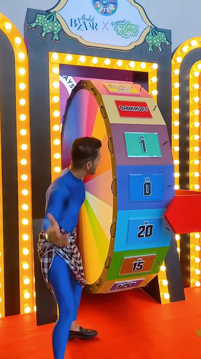 Alif Syukri Terlajak Laris try Absolut Bazaar x Gaya Raya Wheel of Fortune game.