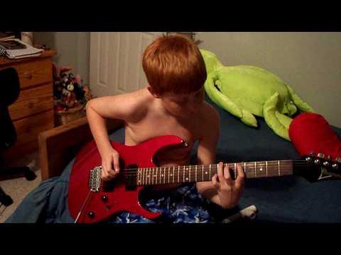 Max playing electric guitar - finger exercise, "Iron Man" and "Sunshine of Your Love" snippets