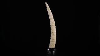 PIERRE KARLIK, Carved Tusk on Igloo Base, c. early 1970s