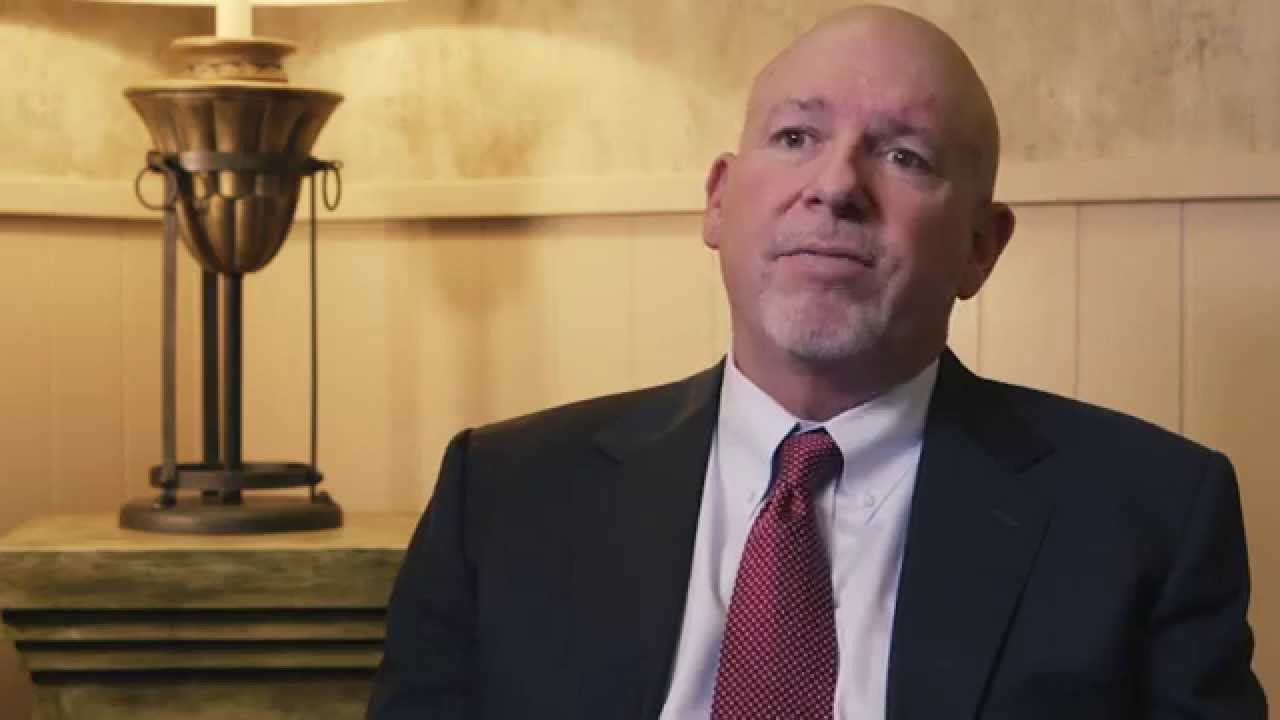 Dr. Landry on his Doctor Background Lapalco Family Dental Marrero