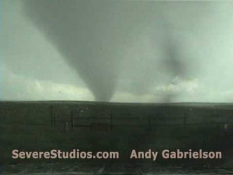 Andy Gabrielson captures up-close video of a tornado in Goshen County, Wyoming on June 5th, 2009. The tornado gets larger and crosses the road right in front of Andy! See more severe weather video, including LIVE storm chasing, at www.severestudios.com