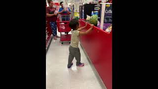 Helping cashier to grab items in Target #child #target #lovelychild #family ly#funnybaby