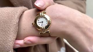 Vidéo: Montre Cartier Colisée de dame en or jaune 18 Cts vers 1990. Quartz. 23 mm.