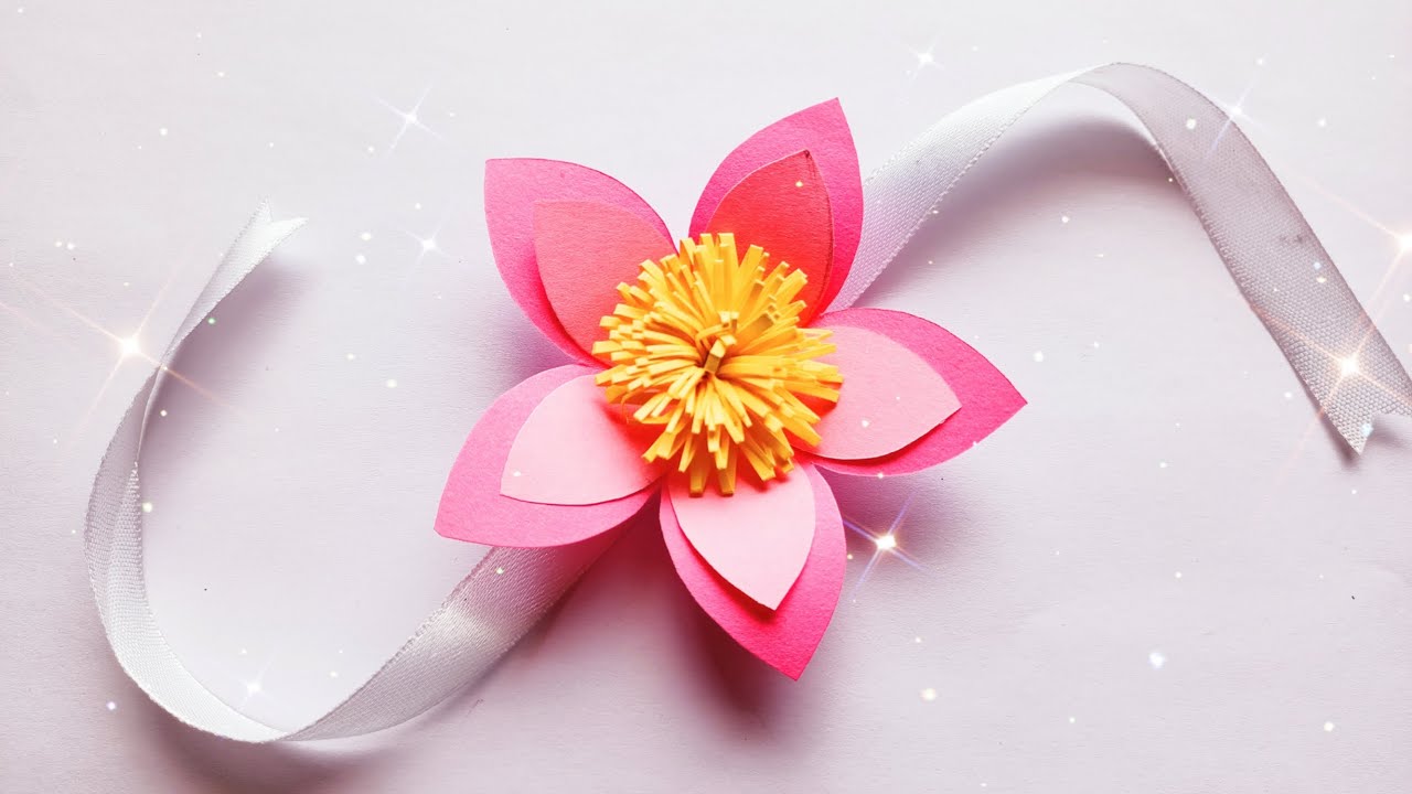 Cute and simple pink paper Rakhi design for school competition | flower ...
