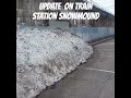 FOLLOWING THE TRAIN STATION SNOW MOUND
