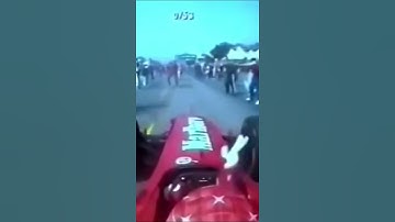 Michael Schumacher somehow avoids hitting fans after winning the 2000 Italian Grand Prix