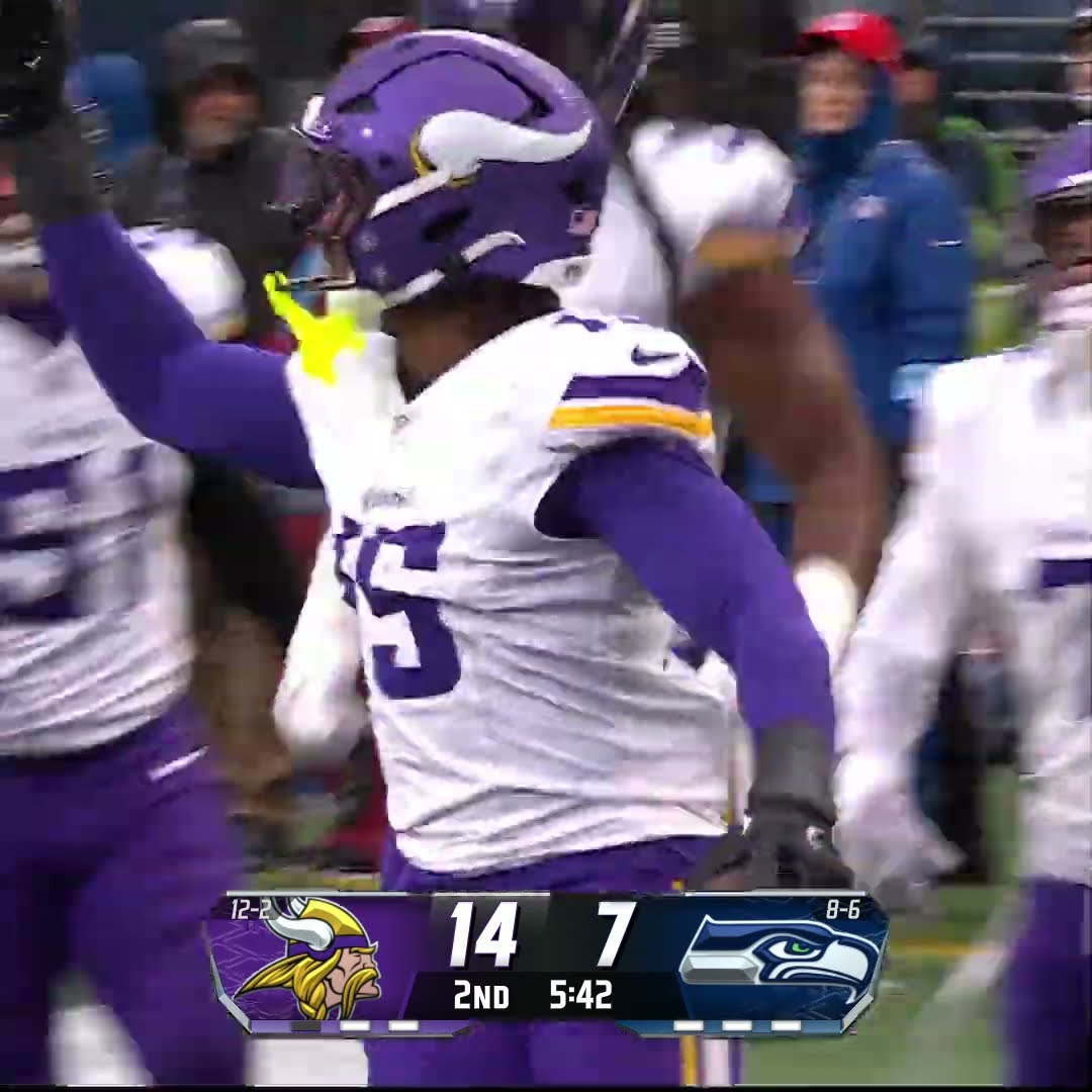 Dallas Turner intercepts the Geno Smith pass vs. Seattle Seahawks