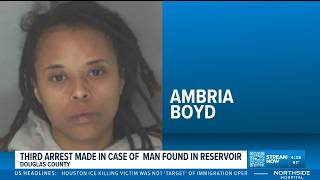 Woman charged after body found in Dog River Reservoir