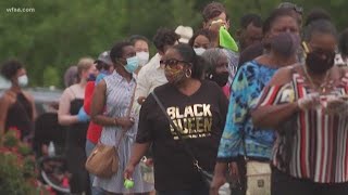 Botham Jean's family pays their respects at George Floyd memorial in Houston