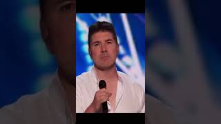 Simon Cowell Sings On Stage