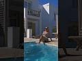A Beautiful Woman Sits By The Pool And Soaks Her Feet Keycath Poolday Vacation 