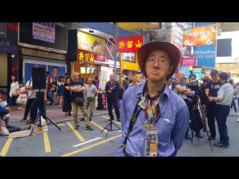 旺角張偉文在旺角羅文唱:情憑誰來定錯對