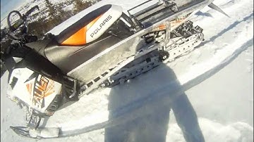 2013 Polaris Assault Turbo crashes straight into a rock.