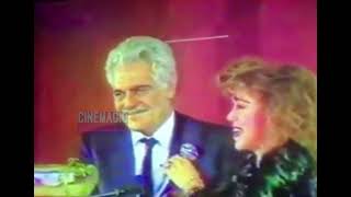 عمر الشريف يسلم أحمد زكي جائزة أحسن ممثل فيلم الإمبراطور ١٩٩١