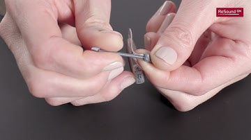 How to insert and remove M&RIE microphone filter