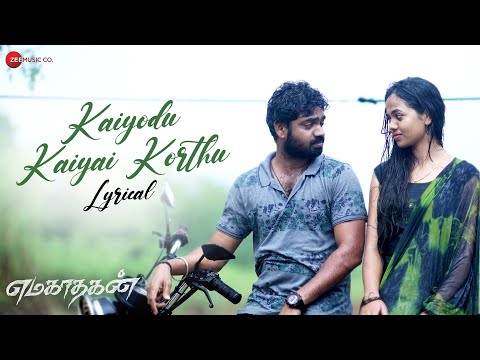 Kaiyodu Kaiyai Korthu Song Lyrics on YouTube