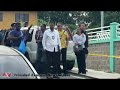 Mother shot dead in front of daughters