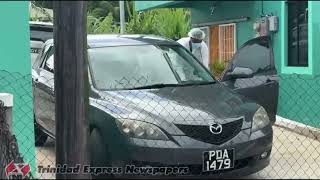 Mother shot dead in front of daughters