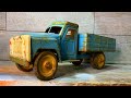 Restoration of a toy truck. It was made at the tractor factory!