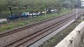 7523次E339+E329雙電頭煤渣斗車貨列
