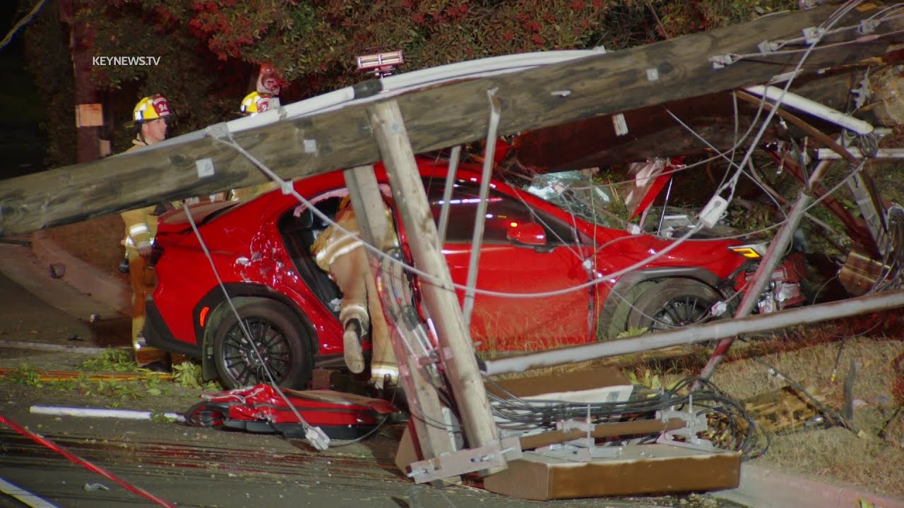 Vehicle Slams Into Power Pole Taking Down Wires, Trapping Driver - YouTube