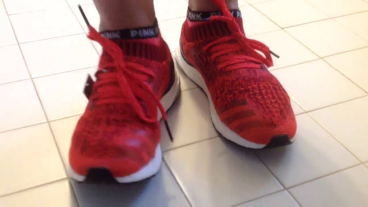 uncaged ultra boost red on feet