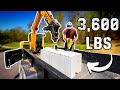 Can a 6 ton mini excavator lift these concrete blocks