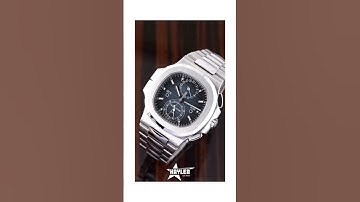Unveiling the Timeless Elegance of the Patek Philippe Nautilus 5990 🌊 | Blue Bezel, Steel Perfection